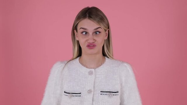 Beautiful girl makes funny faces