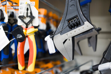 New wrench spanner in construction store . CLose up view , soft focus