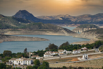 Fototapeta na wymiar Top view of the Iznájar reservoir (Spain) in a beautiful stormy sunset