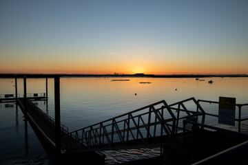 Fototapeta na wymiar Sunset over the River Crouch at Burnham-on-Crouch, Essex