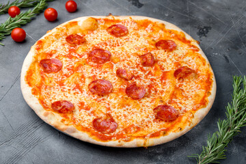 Pepperoni pizza diablo on grey table