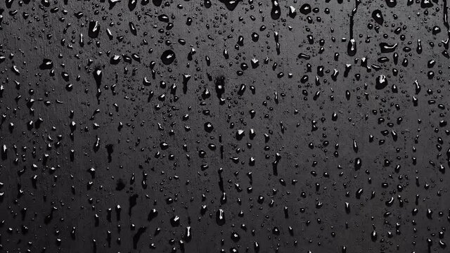 Water droplets on black background.