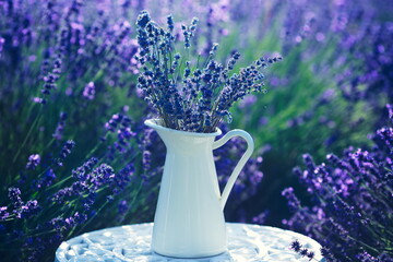 lavender flowers in white jar