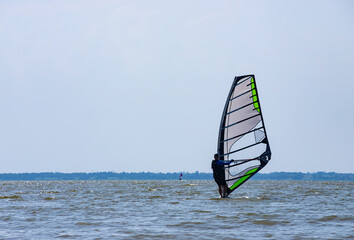 Windsurfing. Entertainment at sea, extreme sports, lifestyle during the summer holidays