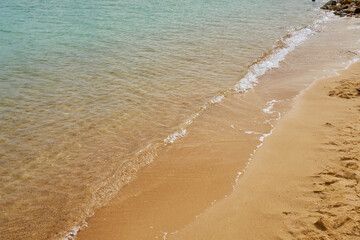 Waves on the tropical sandy beach of the red sea.