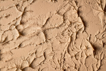 light brown concrete wall texture macro close up