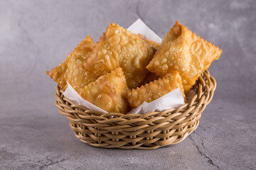 Traditional pastry called pastel  in Brazil. Brazilian snack. Brazilian pastry