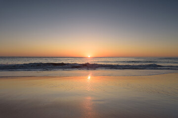 Fototapeta na wymiar Sunset on the beach of Cape Trafalgar, Canos de Meca, Cadiz, Andalusia, Spain