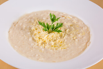Cheese Risotto Italian Cuisine.. Made with rice arboreo and Grana Padano cheese