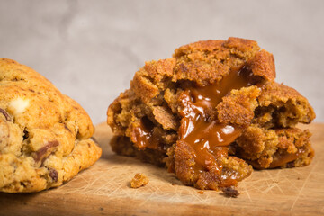 Caramel cookies. Homemade cookies filled with caramel. They are cut in half to see the inside. stuffed