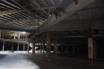 Abandoned shopping mall. Dark urban environment. Large scary place. destruction
