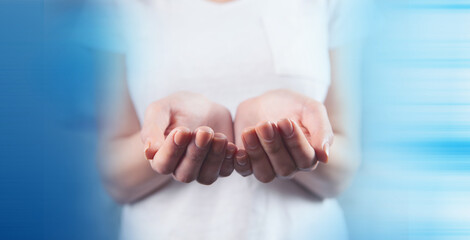 young woman holding empty palms