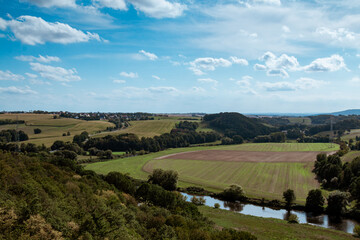 Obraz premium Summer landscape with river and blue clouds