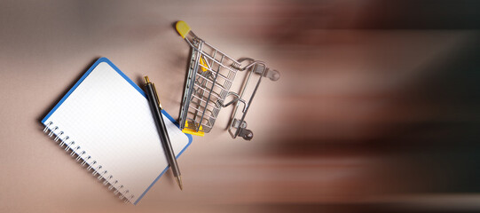 trolley, pen and notebook on the table