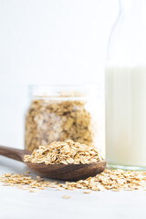 Breakfast cereals. Uncooked oatmeal. Raw oat flakes.
