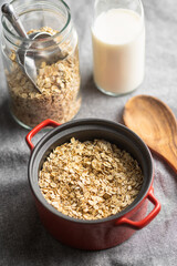 Breakfast cereals. Uncooked oatmeal. Raw oat flakes.