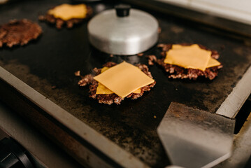 Snack - frying hamburger with mozzarella cheese for smash burger