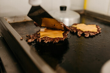 Snack - frying hamburger with mozzarella cheese for smash burger