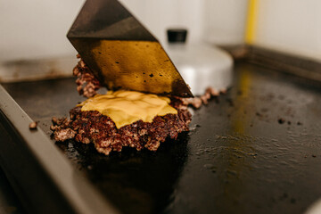Snack - frying hamburger with mozzarella cheese for smash burger