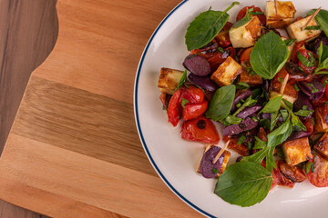 Caprese Salad with Coalho Cheese, Roasted Tomatoes, Black Olives and Basil