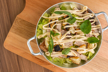 Tuna salad with croutons, lettuce and tomato