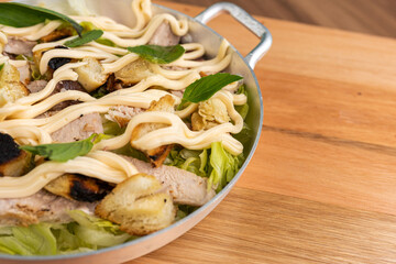 Tuna salad with croutons, lettuce and tomato