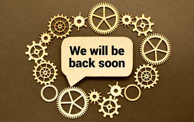 We will be back soon speech bubble and black magnifier isolated on the yellow background. - obrazy, fototapety, plakaty