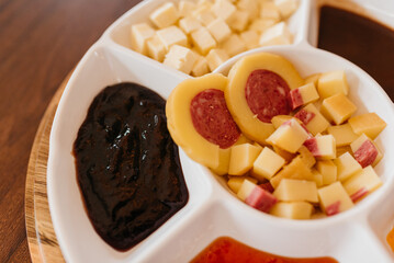 Cold cuts board with cheese, antipasto, salami and pepper jelly