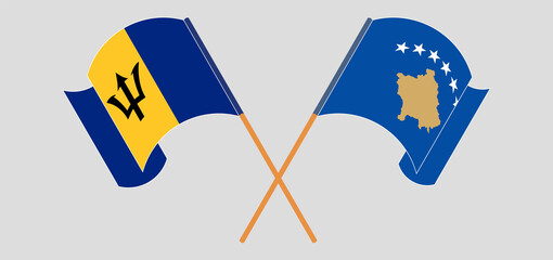 Crossed and waving flags of Barbados and Kosovo