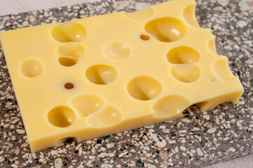 Cheese collection, semi-hard French cheese emmentaler with round holes made from cow milk