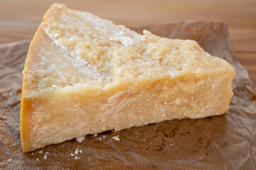 Cheese collection, piece of matured cow cheese pasmesan parmigiano reggiano made from cow milk