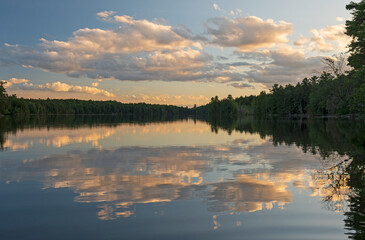 Evening Clouds on a Serene Wilderness Lake