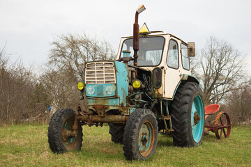 Old lightweight universal wheeled tractor