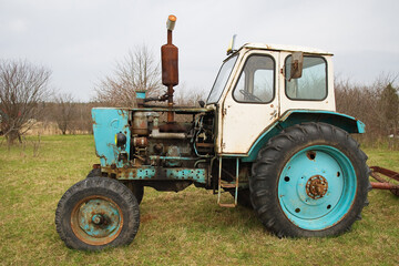 Old lightweight universal wheeled tractor