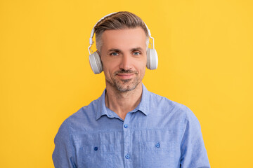 headset device accessory. new technology. smiling unshaven guy. agile business.