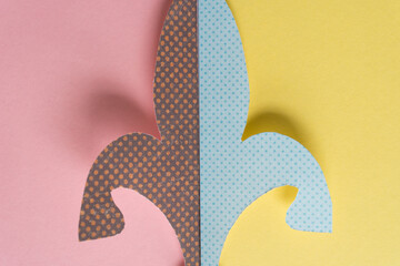 patterned paper fleur-de-lis on pastel pink and yellow