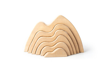 wooden toys on a white background, pyramid, mountains.