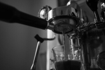 espresso coffee machine in black and white barista portafilter