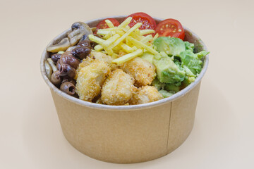 Vegeterian seafood bowl with smoked salmon, shrimp, avocado in take out paper container. Close up, copy space, top view, background.