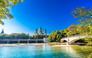 St. Luke's Church Lukaskirche - and isar river in summer landscape of Munich, Bavaria, Germany