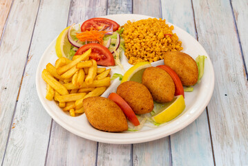 Icli kofte, common throughout the Middle East, part of the Caucasus, and Armenia. It is considered the national dish of Lebanon and Syria. It consists of minced lamb meat with bulgur and spices.