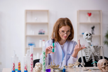 Young female zoologist working at the lab