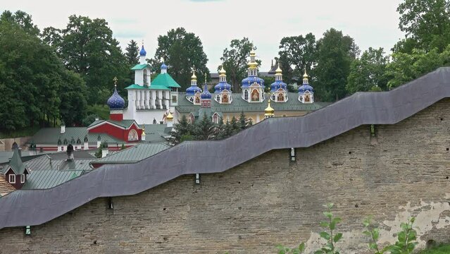 Pskov-Caves monastery or the Pskovo-Pechersky dormition monastery at summer, 4k