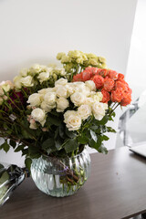 colorful and beautiful bouquet of roses, floral arrangement with fresh flowers, nature as a romantic gift for celebration, detail of petals, stem and leaves