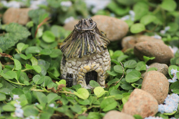 miniature countryside house of dwarfs in a beautiful fantasy world, unique building architecture
