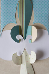 circular element with stylized floral shape on paper