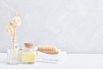 Spa treatments, massages. Background with spa accessories in yellow tones. There is a place for the text.