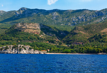 Fototapeta na wymiar Spectacular Balkans mountains and Adriatic Sea . View of Milocer beach in Montenegro near Sveti Stefan