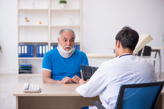 Old male patient visiting young male doctor radiologist
