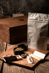 Cannabis Package on a Wooden Rolling Board